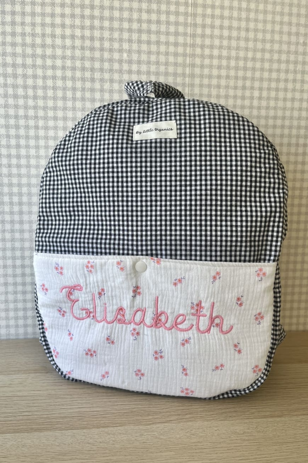 Mochila vichy negro y flores