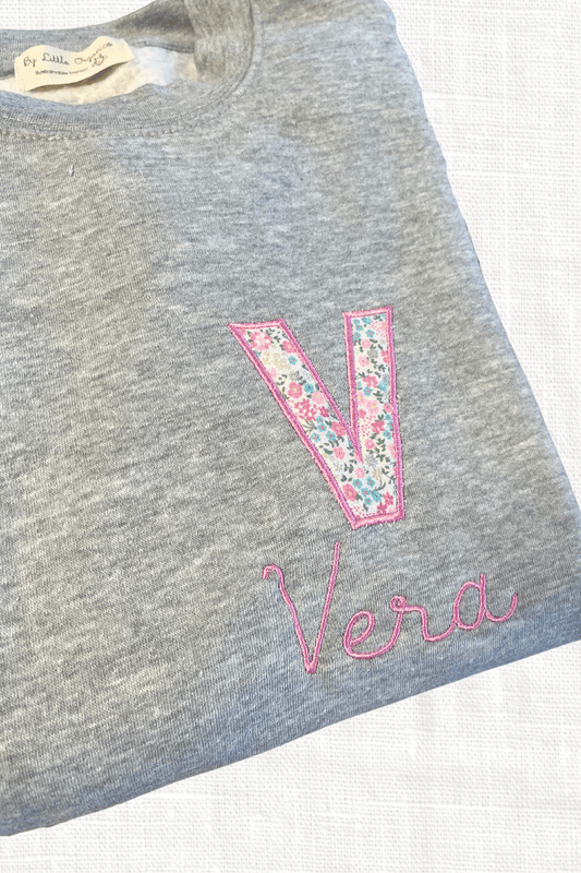 Sudadera inicial estampada flores