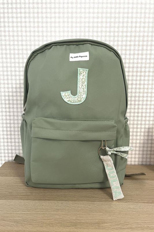 Mochila cole verde flor personalizable