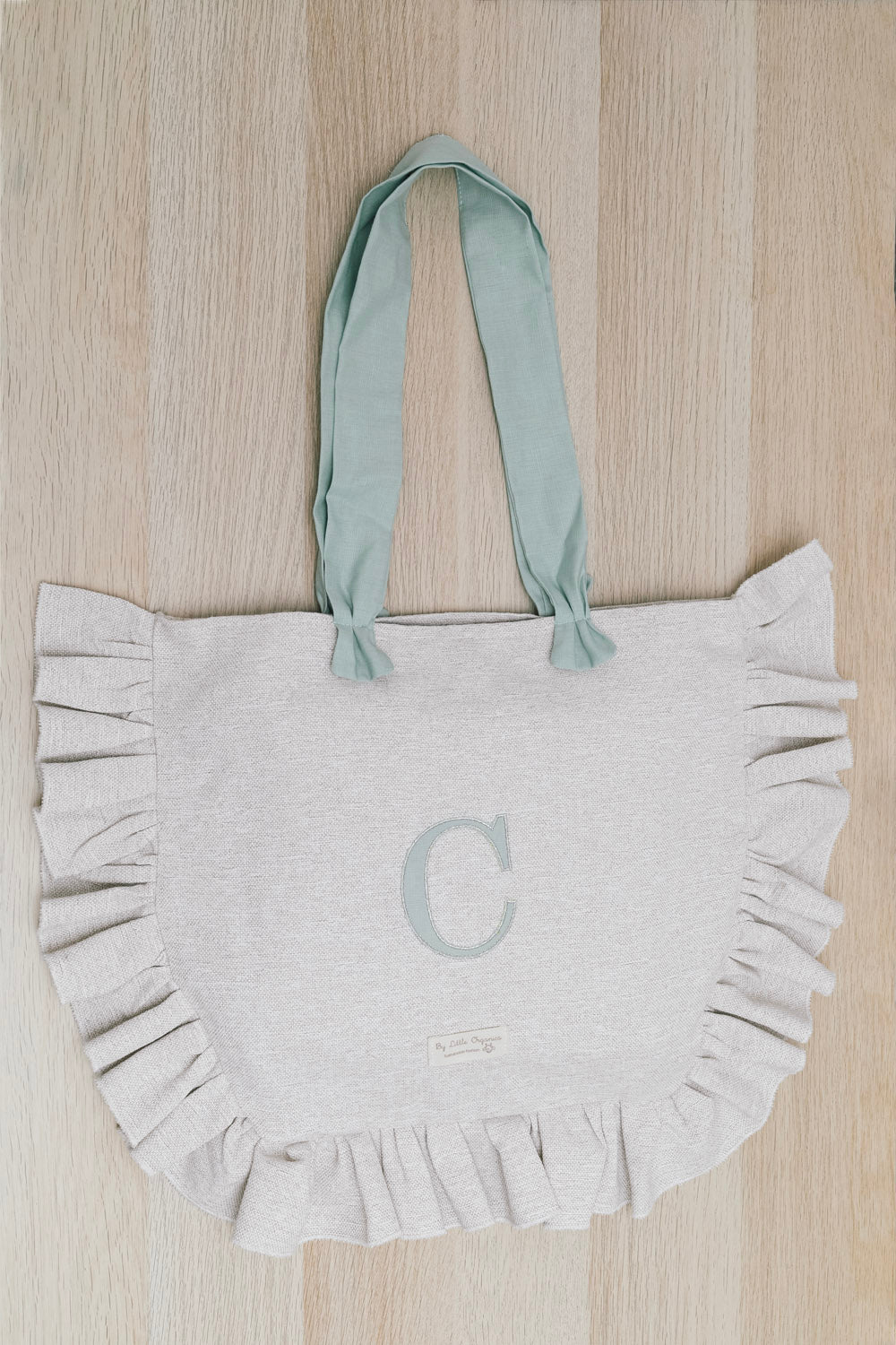 Bolso beige Inicial
