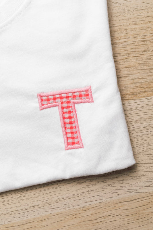 Camiseta blanca inicial flúor