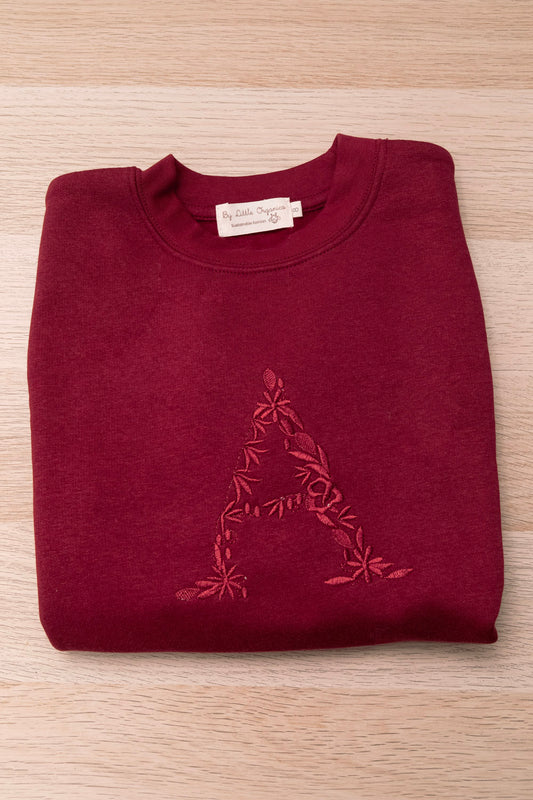 Sudadera inicial unicolor