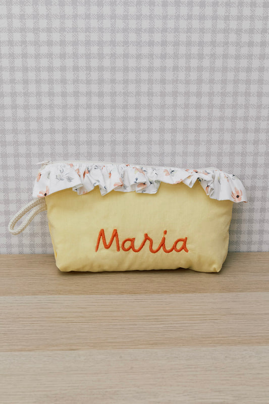 Estuche amarillo volante